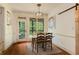 Cozy dining area with hardwood floors and sliding barn door at 374 Beaumont Farms Dr, Sharpsburg, GA 30277