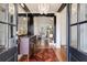 Elegant foyer featuring hardwood floors, chandelier, and an open view of the living area at 374 Beaumont Farms Dr, Sharpsburg, GA 30277