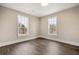 Charming bedroom with hardwood floors, and natural light from the windows at 852 Washington Sw St, Atlanta, GA 30315