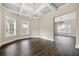 Bright dining room featuring dark wood floors, modern chandelier and windows at 852 Washington Sw St, Atlanta, GA 30315