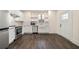 Modern kitchen featuring stainless steel appliances, stylish backsplash, and white cabinets at 852 Washington Sw St, Atlanta, GA 30315