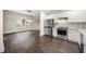Modern kitchen featuring stainless steel appliances, stylish backsplash and an open floorplan at 852 Washington Sw St, Atlanta, GA 30315