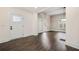 Spacious living room with wood flooring, neutral walls, and white trim at 852 Washington Sw St, Atlanta, GA 30315
