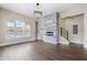Modern living room with hardwood floors, fireplace, and plenty of natural light at 852 Washington Sw St, Atlanta, GA 30315