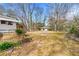 Expansive backyard featuring a shed and lush greenery and mature trees at 1082 Green Valley Nw Dr, Conyers, GA 30012