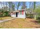 Charming outbuilding featuring a covered carport and a well-maintained exterior at 1082 Green Valley Nw Dr, Conyers, GA 30012