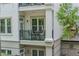 Charming balcony offers a cozy spot for outdoor relaxation and dining with peaceful neighborhood views at 11 Perimeter E Ctr # 1203, Dunwoody, GA 30346
