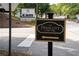 Community sign for The Prescott at Park Place Condominiums with an arrow at 11 Perimeter E Ctr # 1203, Dunwoody, GA 30346