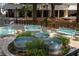 Exterior shot of a large courtyard with landscaping, tables, chairs, and benches at 11 Perimeter E Ctr # 1203, Dunwoody, GA 30346