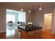 Living room showcasing an island with barstools and a view of the seating area at 11 Perimeter E Ctr # 1203, Dunwoody, GA 30346