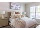 Comfortable main bedroom with a luxurious king-size bed and an abundance of soft pillows at 11 Perimeter E Ctr # 1203, Dunwoody, GA 30346