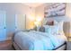 Serene main bedroom featuring a plush king bed, and a decorative painting above the headboard at 11 Perimeter E Ctr # 1203, Dunwoody, GA 30346