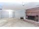 Unfinished basement featuring a brick fireplace, and ample room for renovation projects at 201 Smithstone Path, Fayetteville, GA 30214