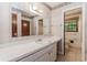 Bathroom features a long white vanity with sink and traditional style at 201 Smithstone Path, Fayetteville, GA 30214