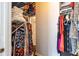 Large walk-in closet with dual rods, shelving, and access to hall at 2700 Pine Tree Ne Rd # 2204, Atlanta, GA 30324