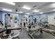 Spacious fitness center with weight machines, free weights, and mirrored walls for a complete workout at 2700 Pine Tree Ne Rd # 2204, Atlanta, GA 30324