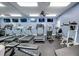 Modern gym featuring treadmills, elliptical machines, TVs, and ample workout equipment at 2700 Pine Tree Ne Rd # 2204, Atlanta, GA 30324