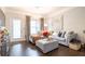 Inviting living room with hardwood floors, plush sofa, and elegant decor throughout at 2700 Pine Tree Ne Rd # 2204, Atlanta, GA 30324