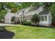 Attractive two-story home featuring brick and siding with an attached two-car garage at 4105 Peachtree Dunwoody Ne Rd, Atlanta, GA 30342