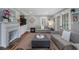 Elegant living room featuring neutral colors, a fireplace, and ample seating at 4105 Peachtree Dunwoody Ne Rd, Atlanta, GA 30342