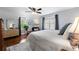 Spacious main bedroom with hardwood floors, neutral walls, and ample natural light at 4105 Peachtree Dunwoody Ne Rd, Atlanta, GA 30342