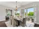 Dining room with a view of the outdoor patio at 7120 Lullwater Rd, Cumming, GA 30040