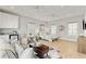 Open-concept living space combines a seating area, kitchenette, and sleeping area, perfect for relaxation and entertainment at 7120 Lullwater Rd, Cumming, GA 30040