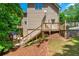Multi-level deck with gazebo, overlooking a well-manicured lawn and garden; enjoy outdoor living with this great backyard retreat at 12350 Stevens Creek Dr, Alpharetta, GA 30005