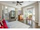 Formal dining room with hardwood floors and large window with natural lighting at 12350 Stevens Creek Dr, Alpharetta, GA 30005