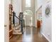Two-story foyer features hardwood floors, staircase, and great natural light at 12350 Stevens Creek Dr, Alpharetta, GA 30005