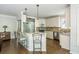 Stylish kitchen with stainless steel appliances, granite countertops, and a breakfast bar area at 12350 Stevens Creek Dr, Alpharetta, GA 30005
