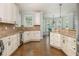 Bright kitchen with granite counters, stainless appliances, and hardwood floors overlooking breakfast area at 12350 Stevens Creek Dr, Alpharetta, GA 30005