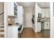 Charming kitchen area with desk space, white cabinets, and stainless steel appliances at 12350 Stevens Creek Dr, Alpharetta, GA 30005