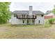 Spacious backyard featuring a home exterior with a walkout basement and wooden deck at 2682 Freemans Walk Path, Dacula, GA 30019