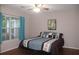 Tranquil bedroom featuring a large window offering plenty of natural light at 3024 Orchard Ridge Cir, Duluth, GA 30096