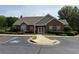 Community clubhouse with ample parking and beautifully landscaped grounds at 3024 Orchard Ridge Cir, Duluth, GA 30096