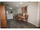 Dining room with wood flooring, dining table, and built-in china cabinet at 3024 Orchard Ridge Cir, Duluth, GA 30096