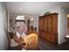 Dining room featuring a large wooden hutch, table with seating for four, and an open floor plan at 3024 Orchard Ridge Cir, Duluth, GA 30096