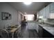 Kitchen space featuring white cabinets, granite counters, and a cozy breakfast nook at 3024 Orchard Ridge Cir, Duluth, GA 30096