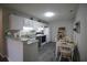 Efficient kitchen with white cabinetry, granite countertops, and stainless appliances at 3024 Orchard Ridge Cir, Duluth, GA 30096