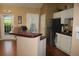 Kitchenette area with stainless steel refrigerator and countertops, perfect for residents at 3024 Orchard Ridge Cir, Duluth, GA 30096