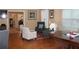 Inviting living room with hardwood floors and lots of seating at 3024 Orchard Ridge Cir, Duluth, GA 30096