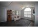 Comfortable living room with a vaulted ceiling and bright natural light from a large window at 3024 Orchard Ridge Cir, Duluth, GA 30096