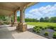 Elegant clubhouse with stone columns and expansive green lawns, ideal for gatherings at 655 Grove Manor Ct, Suwanee, GA 30024