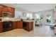 Modern kitchen with stainless steel appliances and a cozy breakfast nook at 655 Grove Manor Ct, Suwanee, GA 30024