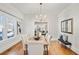 Elegant dining room featuring hardwood floors, chandelier lighting and traditional design at 1050 Lawton Sw Ave, Atlanta, GA 30310
