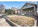 Street view of home featuring a covered porch, lawn, and convenient sidewalk access at 1050 Lawton Sw Ave, Atlanta, GA 30310