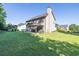 Wide backyard featuring a gazebo and lush green lawn at 1500 Highland Farm Dr, Suwanee, GA 30024