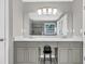 Bathroom with dual sinks, and a large glass door shower at 1500 Highland Farm Dr, Suwanee, GA 30024