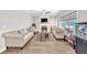 Spacious living room with hardwood floors, fireplace, and lots of natural light at 1500 Highland Farm Dr, Suwanee, GA 30024